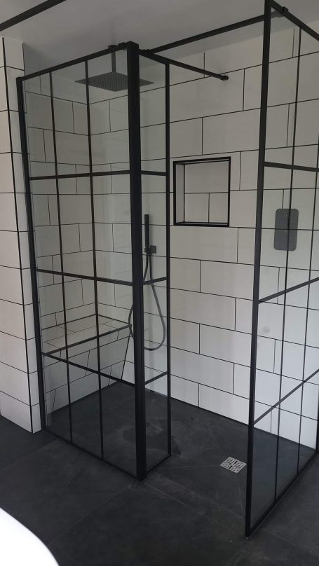  Stylish black-framed glass shower enclosure